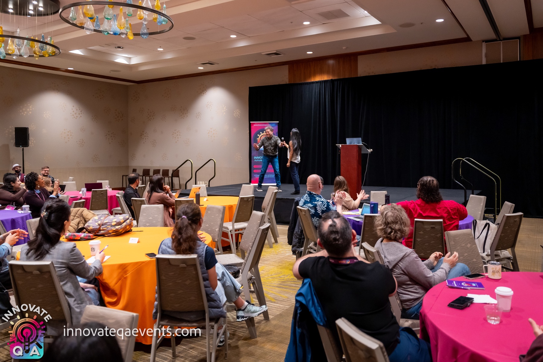 Josh Penzell facilitating an audience exercise at InnovateQA 2026